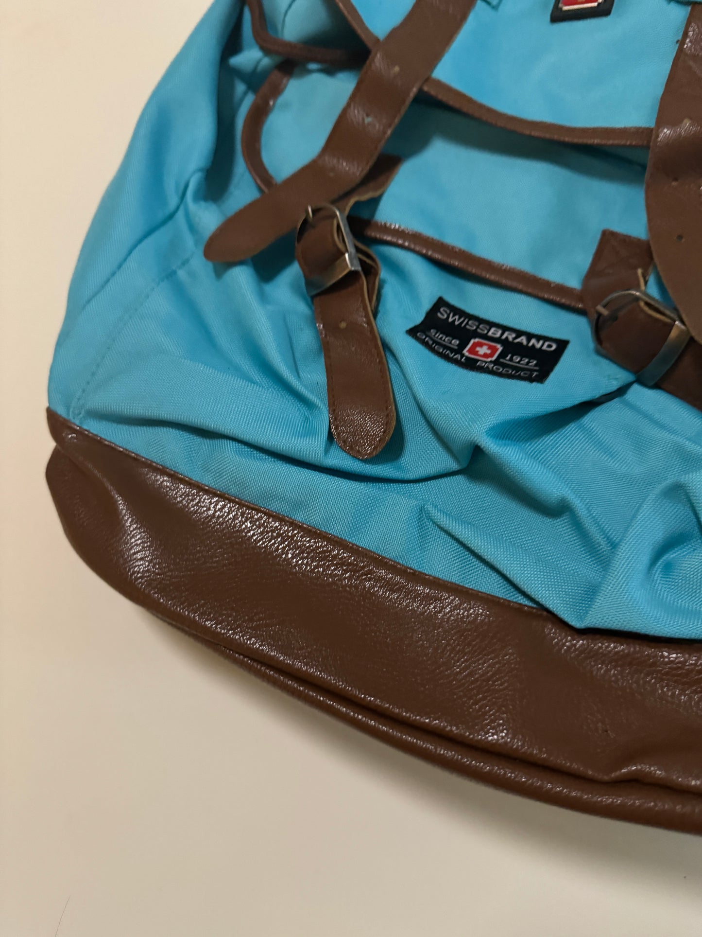 Mochila aqua con cafe