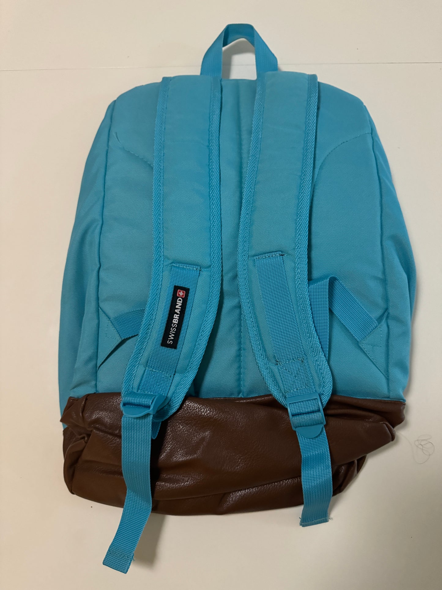 Mochila aqua con cafe
