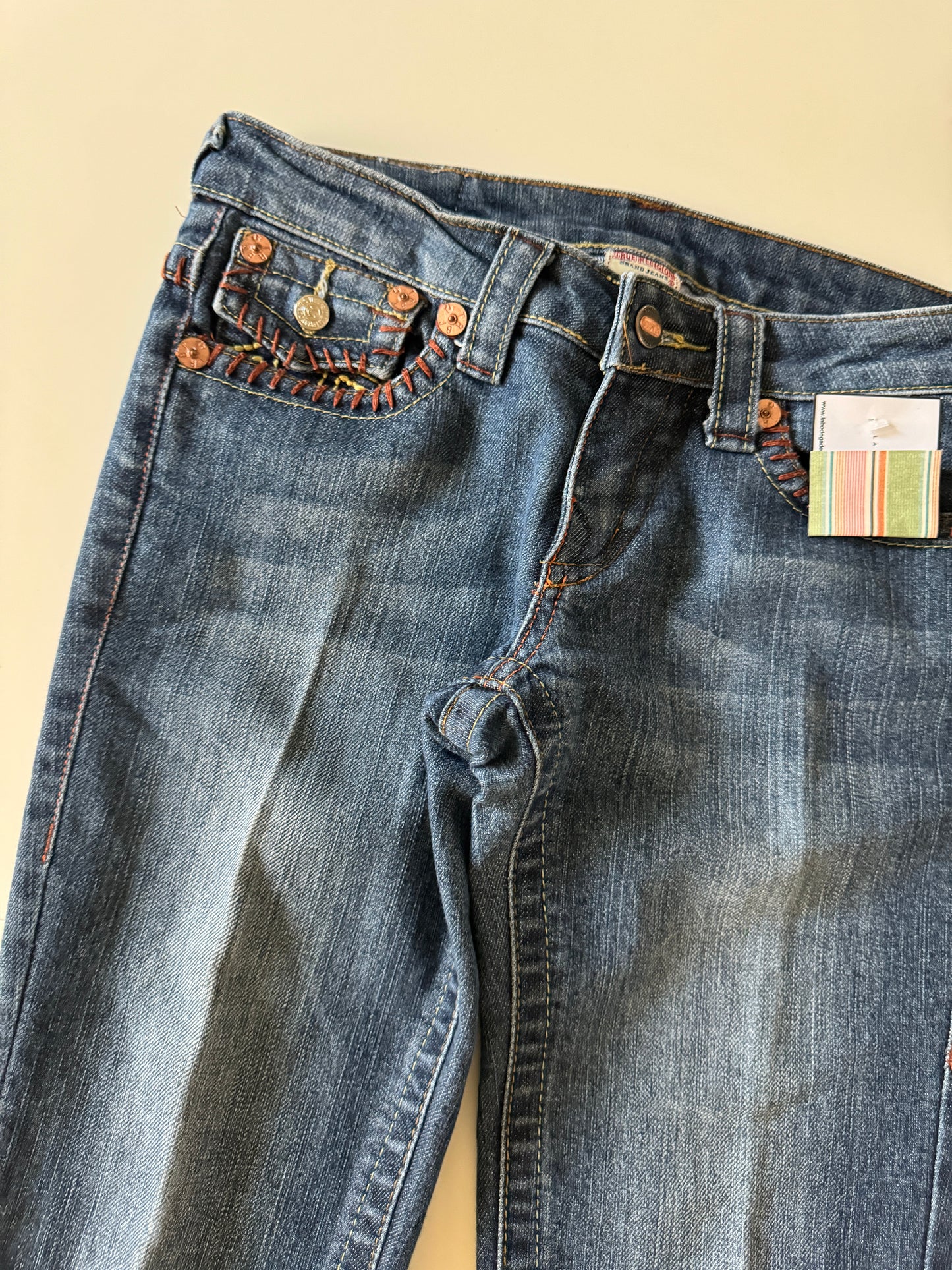 Jeans tiro bajo, con decoracion de puntadas, Talla 25, Mujer