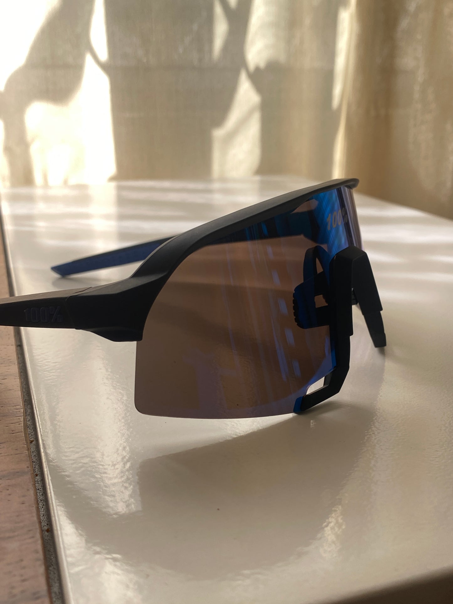 Lentes deportivos reflejo azul