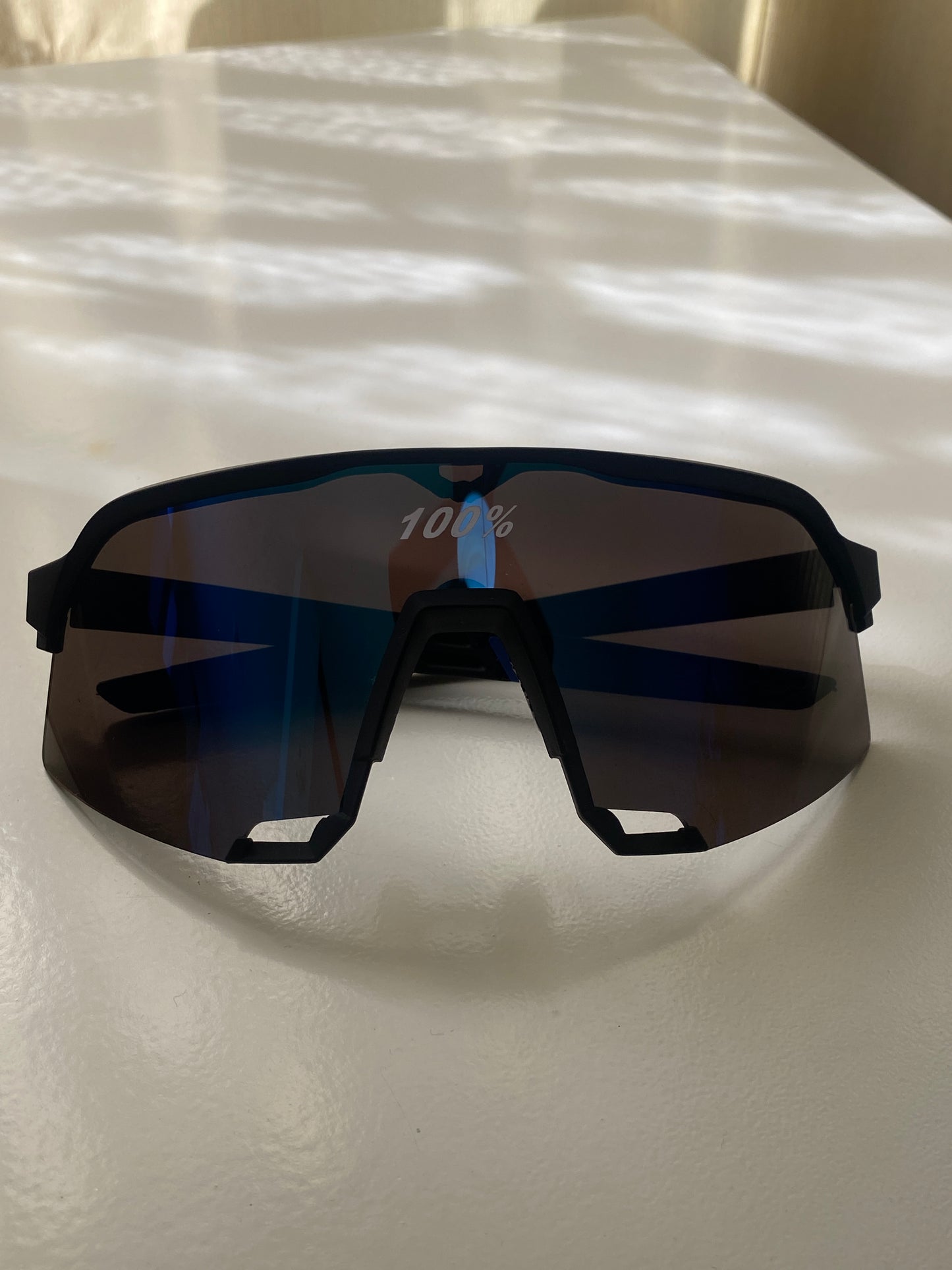 Lentes deportivos reflejo azul