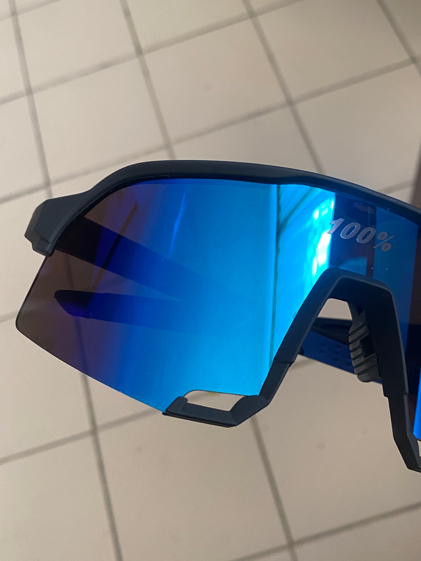 Lentes deportivos reflejo azul