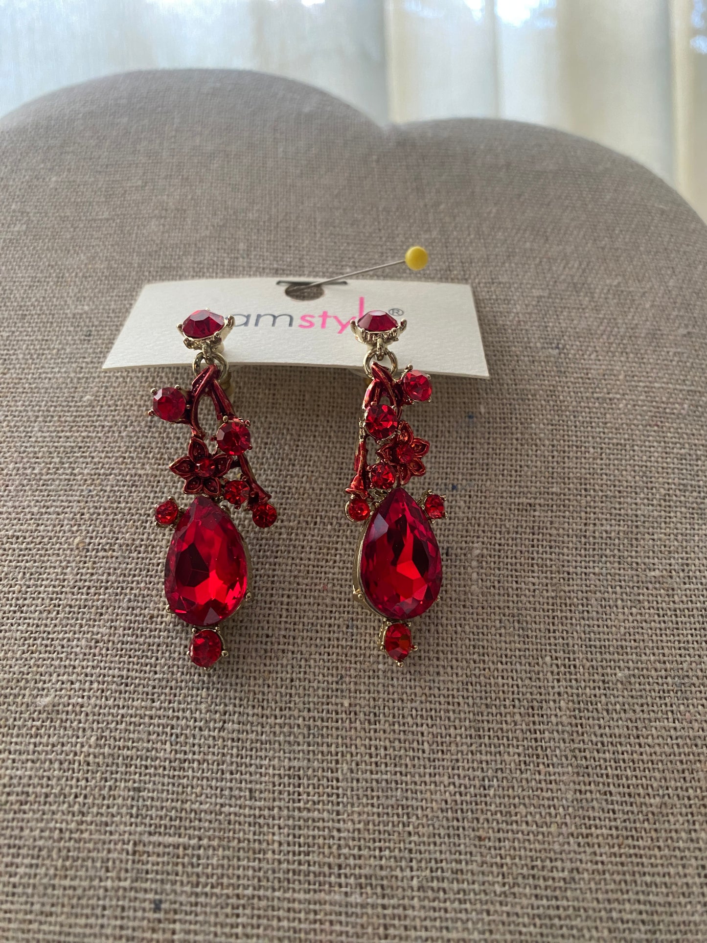 Aretes rojos