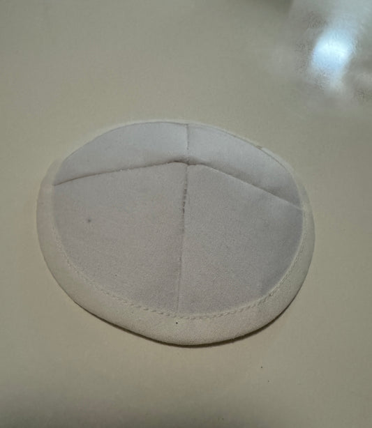 Kipa blanca, Niño