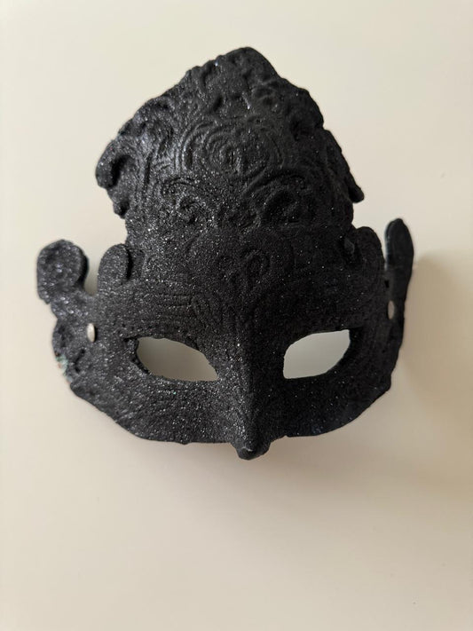 Mascara negra con glitter